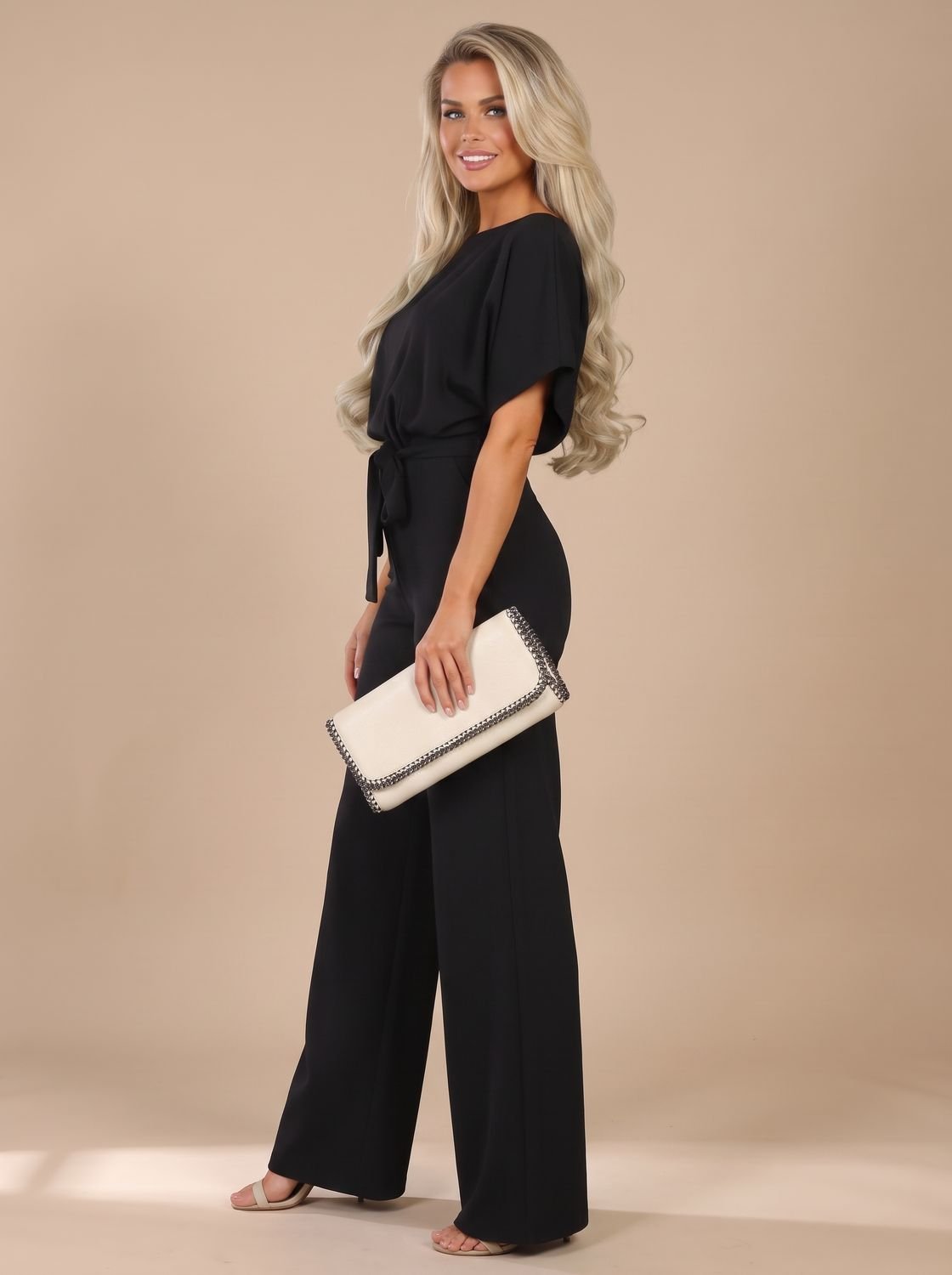 Damesjumpsuit met korte mouwen, strikceintuur en wijde pijpen