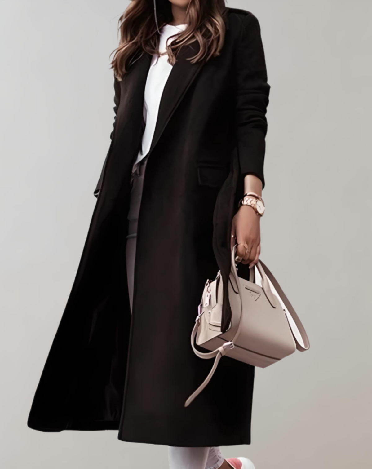 Elegante lange damesjas met ceintuur