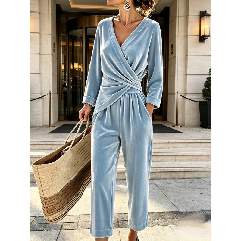 Fluwelen damesjumpsuit met wikkelbovenstuk, getailleerde drapering en wijde enkellange pijpen
