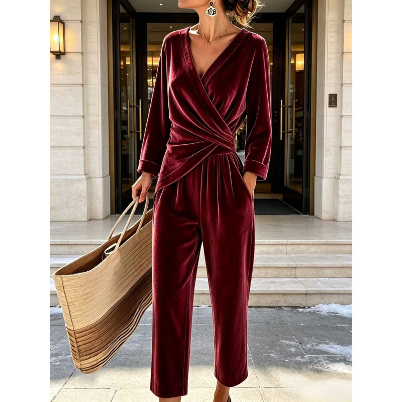 Fluwelen damesjumpsuit met wikkelbovenstuk, getailleerde drapering en wijde enkellange pijpen