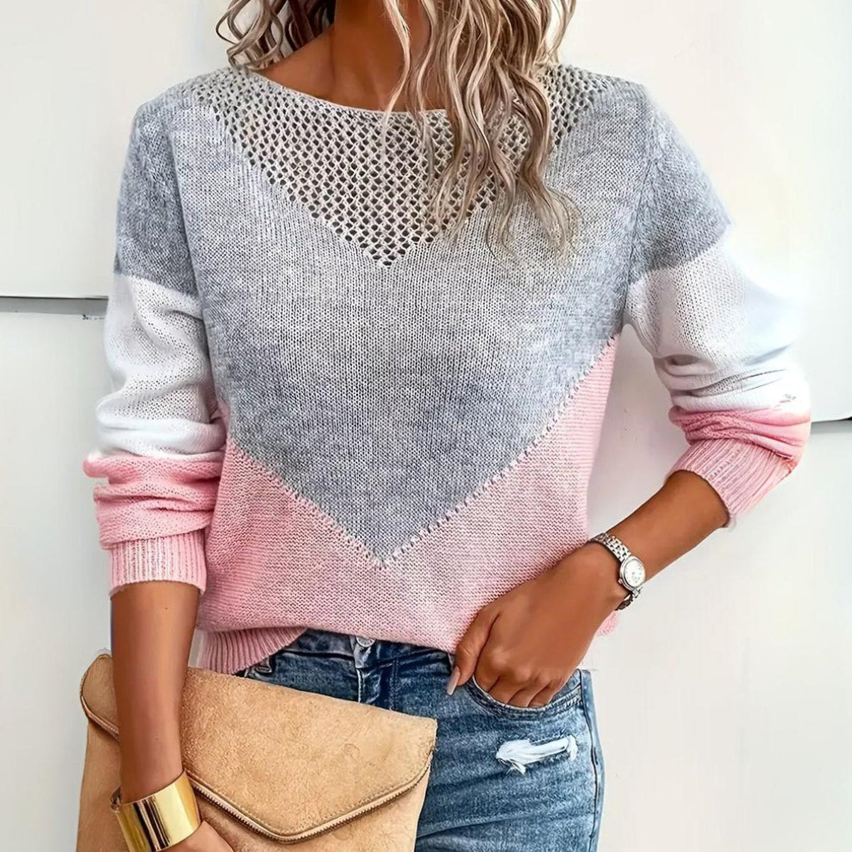 Gebreide damestrui met colourblock, mesh-detail en relaxte pasvorm
