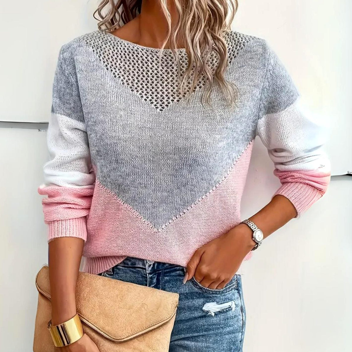 Gebreide damestrui met colourblock, mesh-detail en relaxte pasvorm