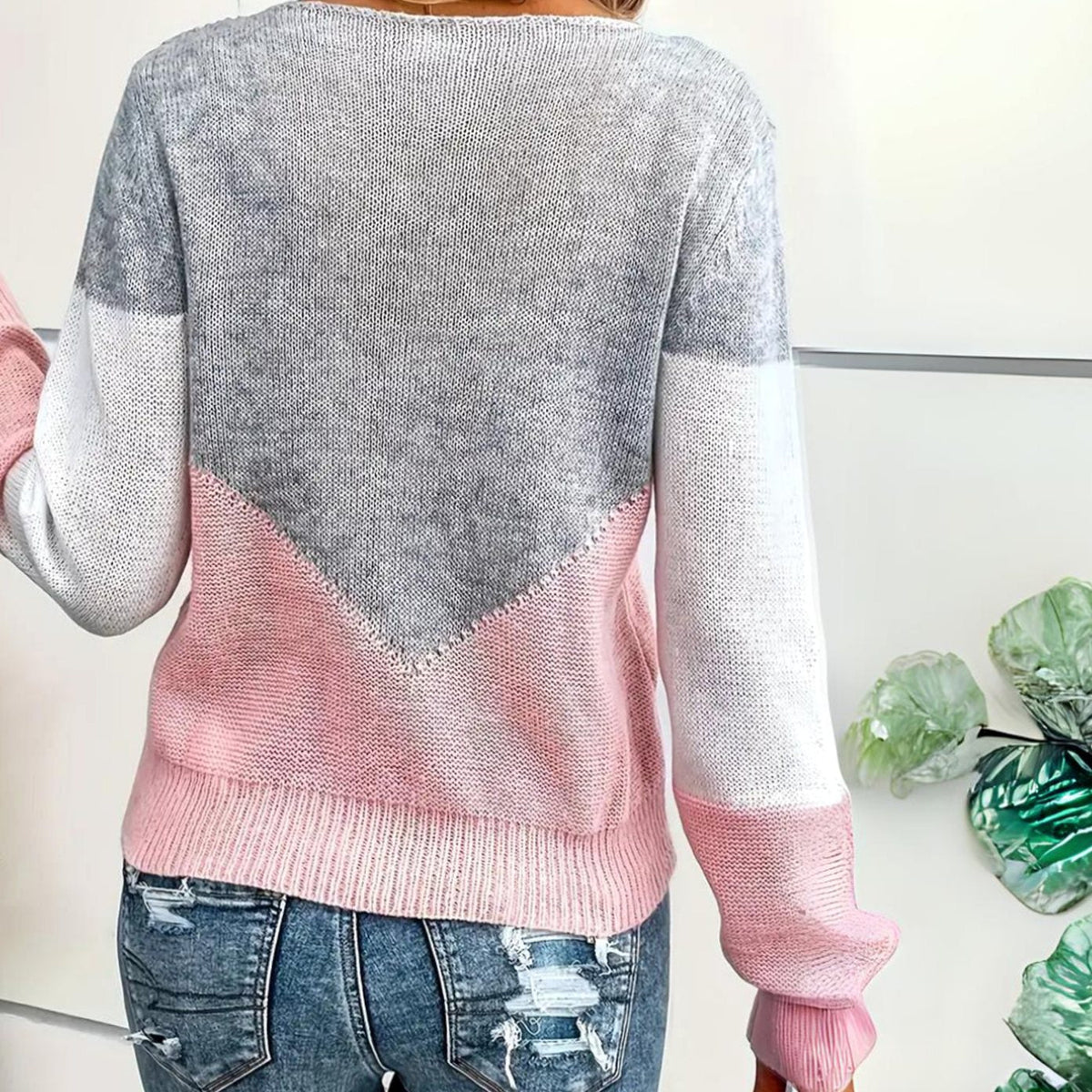 Gebreide damestrui met colourblock, mesh-detail en relaxte pasvorm