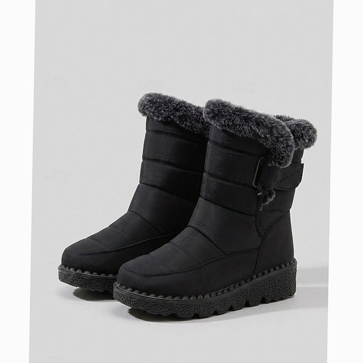 Halflange gewatteerde snowboots voor dames met imitatiebontrand