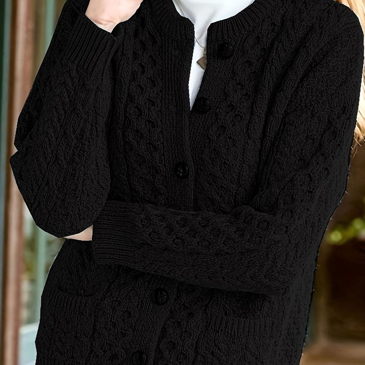Kabelgebreid relaxed vest met knoopsluiting voor dames