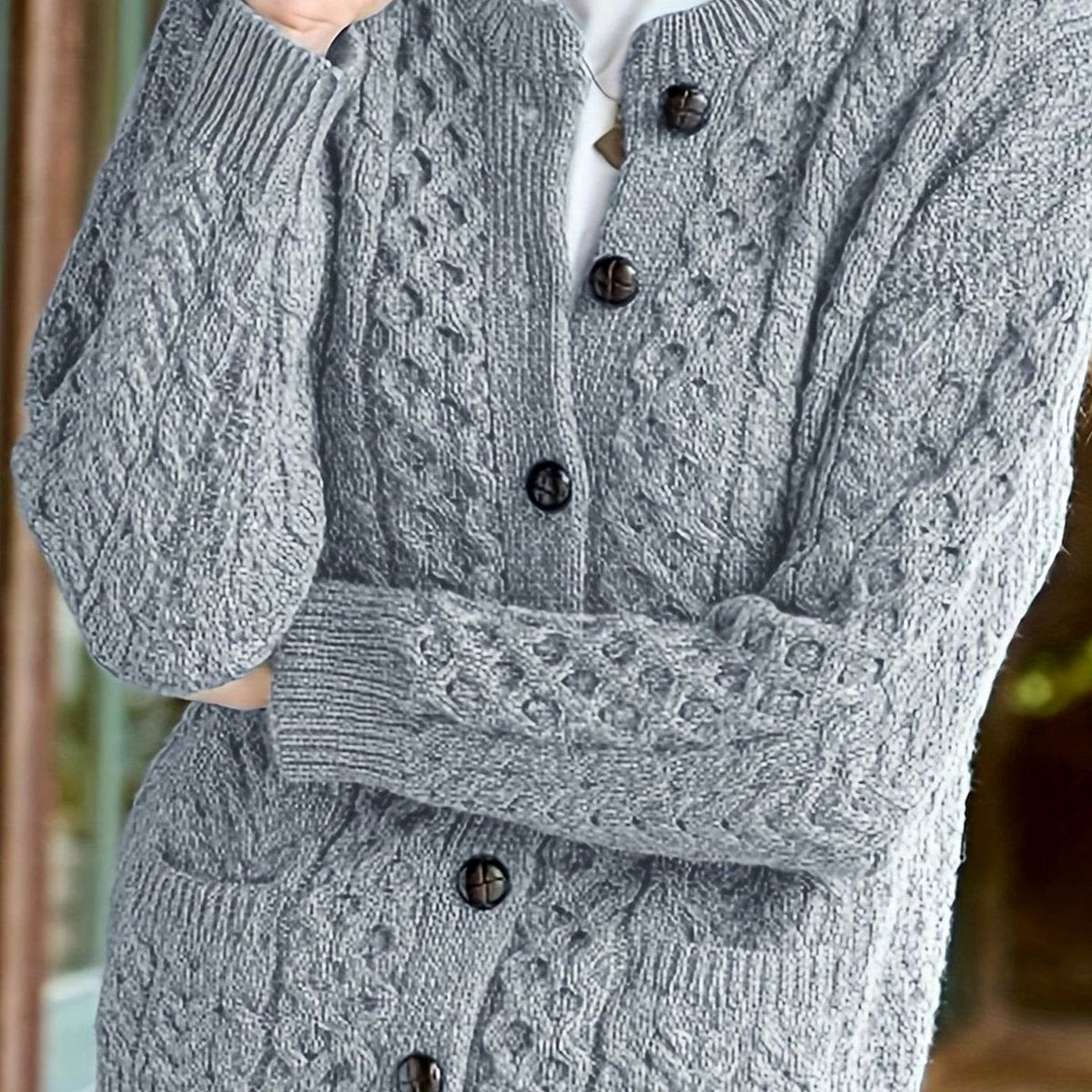 Kabelgebreid relaxed vest met knoopsluiting voor dames