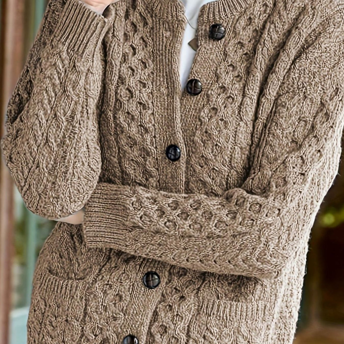 Kabelgebreid relaxed vest met knoopsluiting voor dames