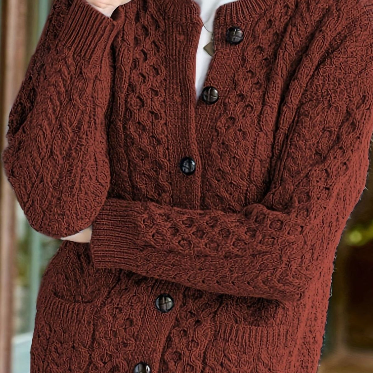 Kabelgebreid relaxed vest met knoopsluiting voor dames