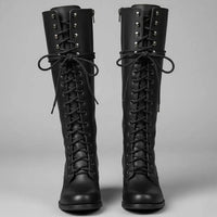 Kniehoge damesveterlaarzen met studs en blokhak