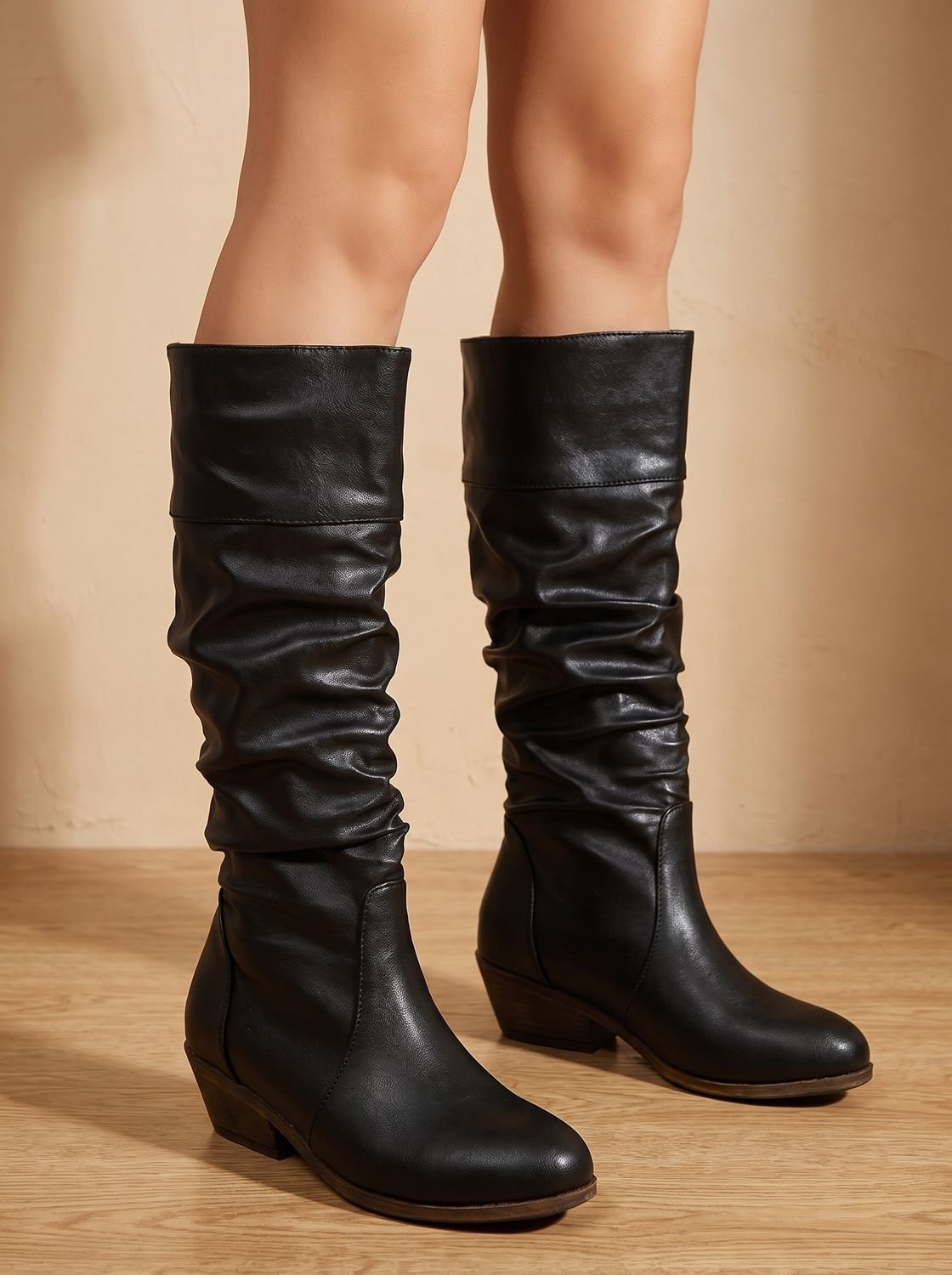 Kniehoge slouchy western-instaplaarzen met blokhak voor dames