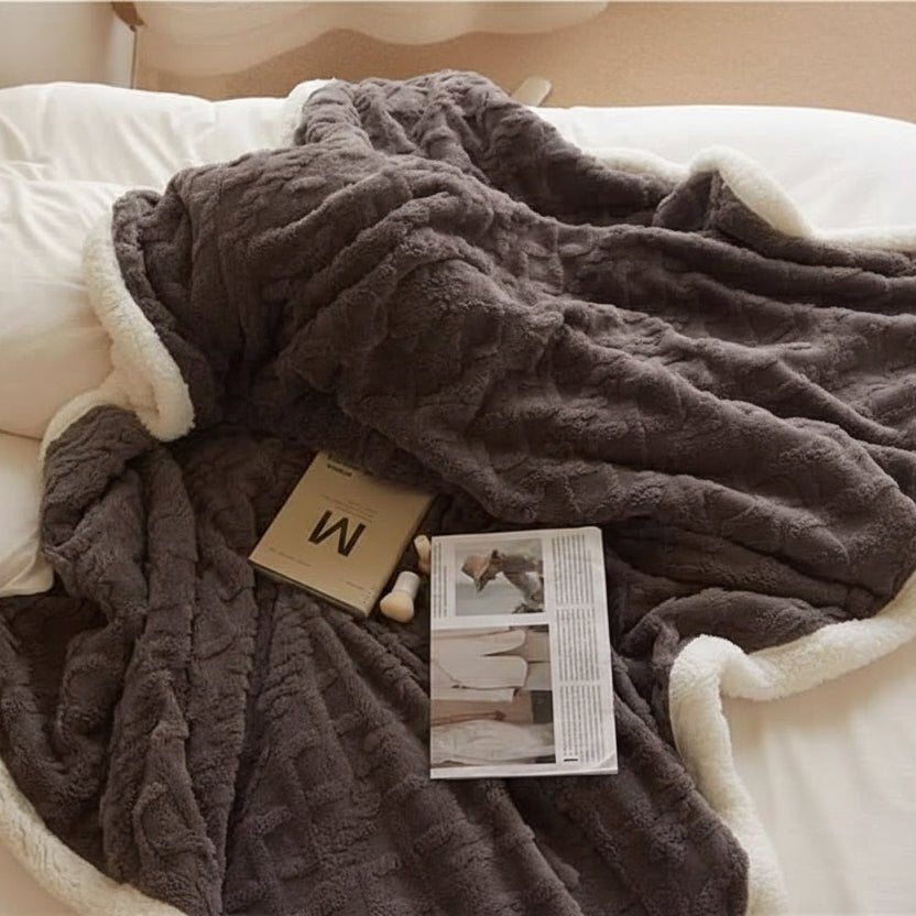 LAMMARA – Fluffy lamswoldeken voor maximale warmte