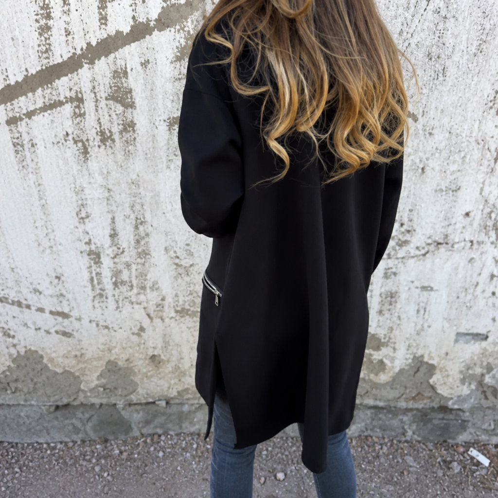 Lang openvallend vest met capuchon