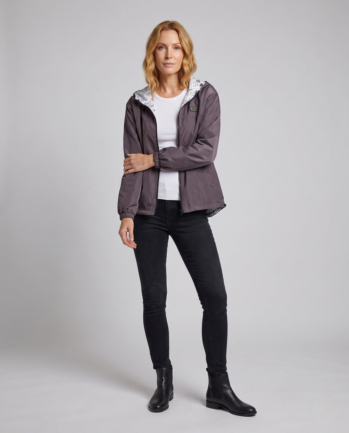 Lichtgewicht unisex windjack met capuchon, bedrukte voering en trekkoord