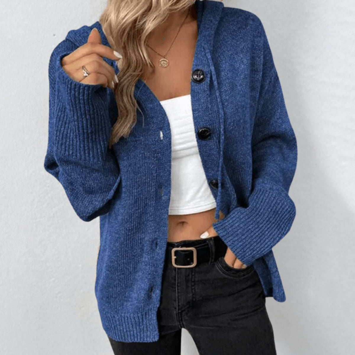 Oversized damesvest met capuchon en knoopsluiting