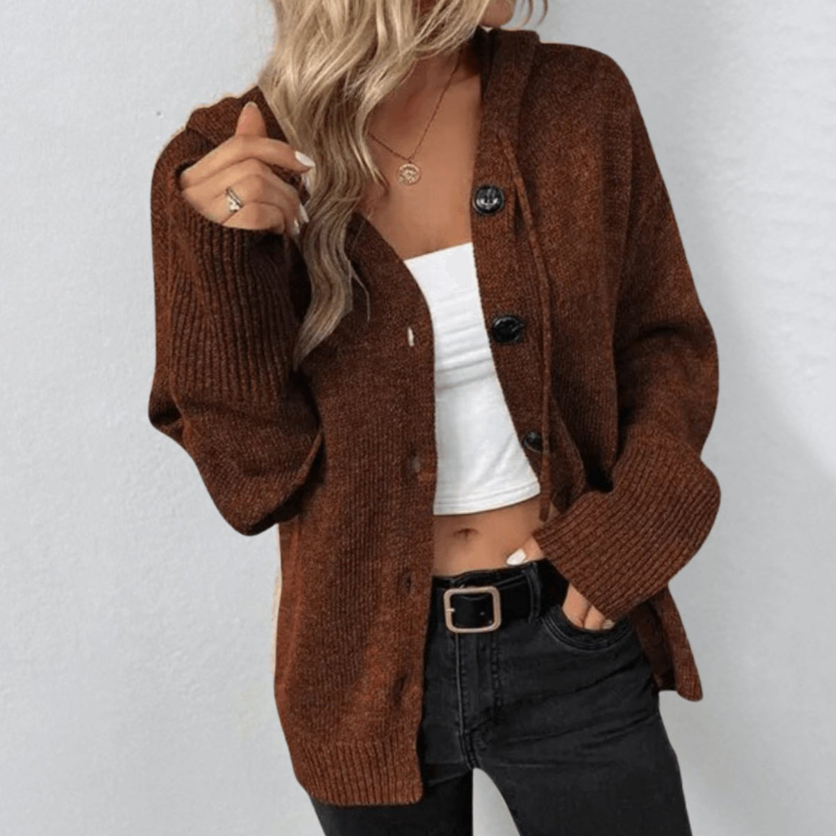 Oversized damesvest met capuchon en knoopsluiting