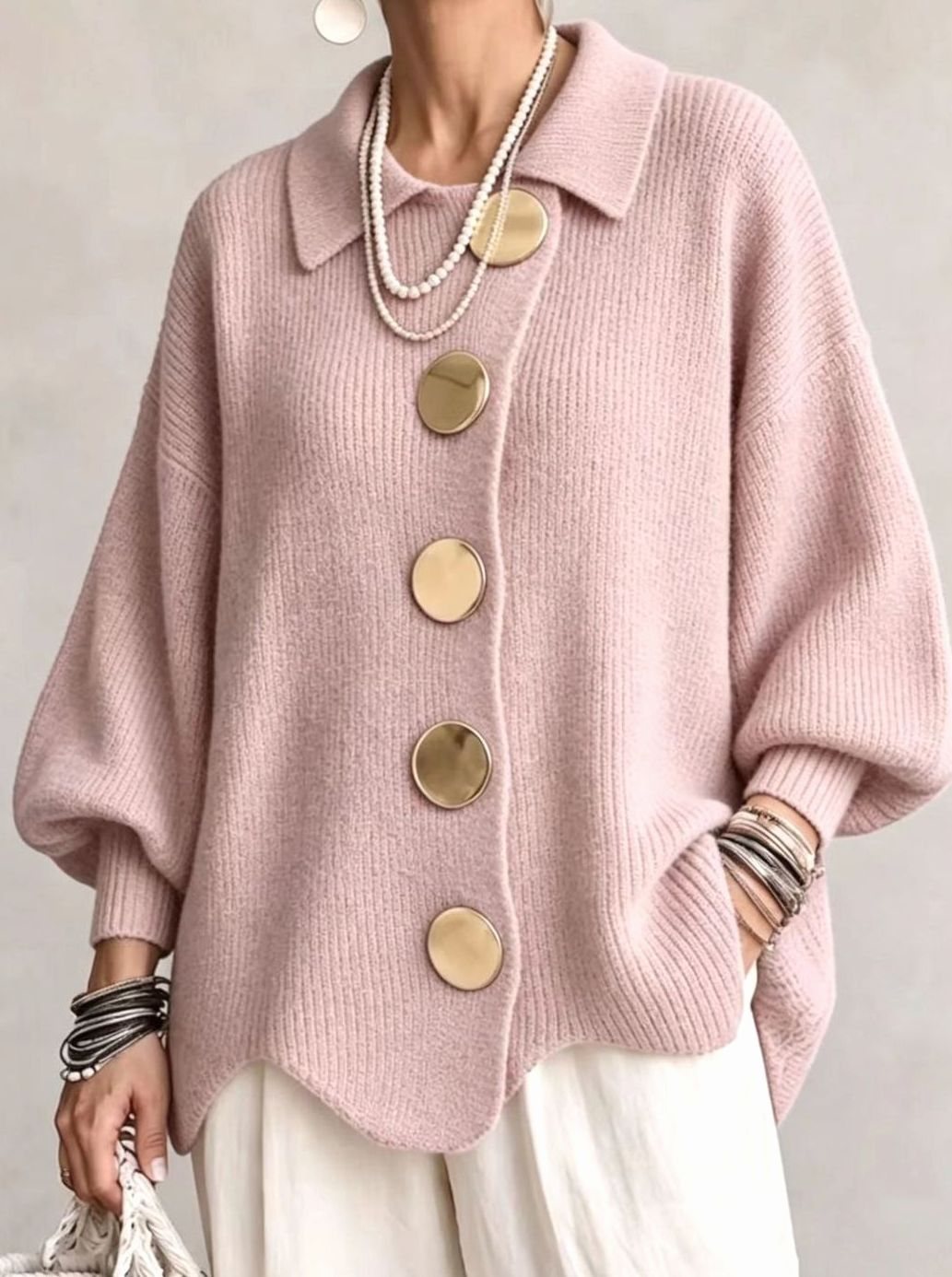 Oversized gebreid damesvest met gouden knopen en lantaarnmouwen