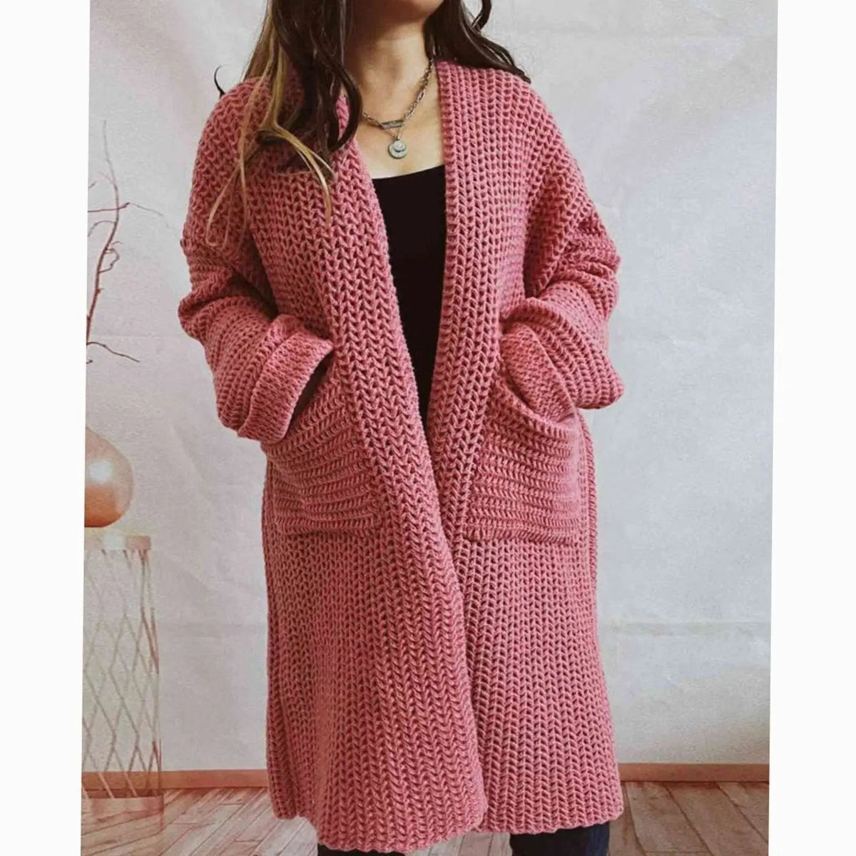 Oversized grofgebreid openvallend damesvest met zakken
