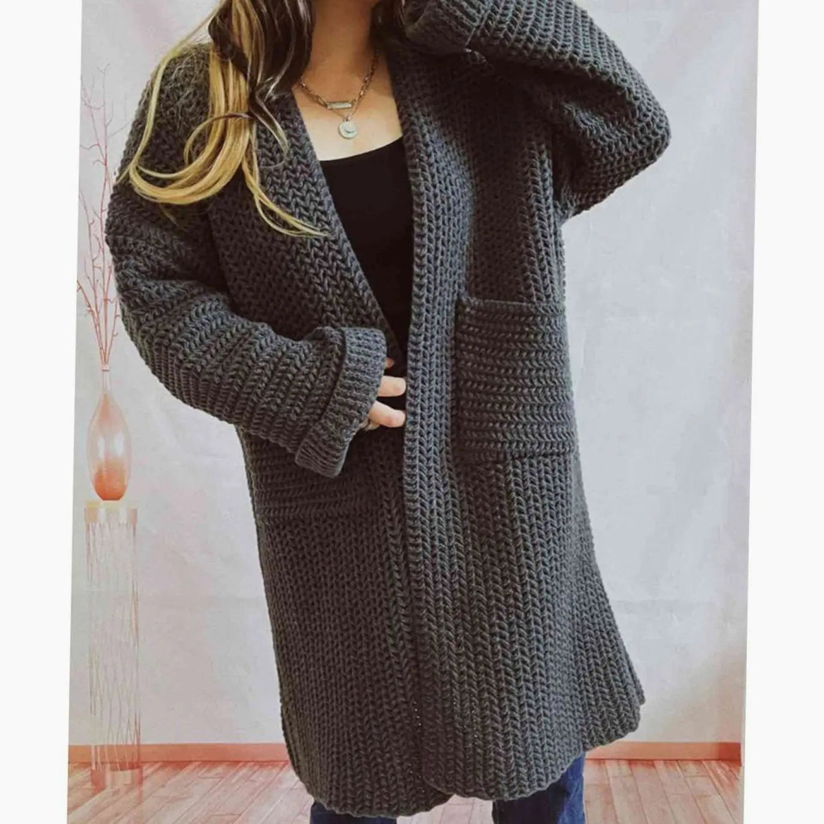 Oversized grofgebreid openvallend damesvest met zakken
