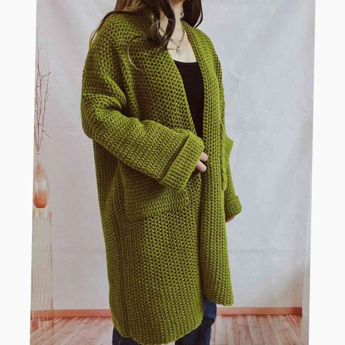 Oversized grofgebreid openvallend damesvest met zakken