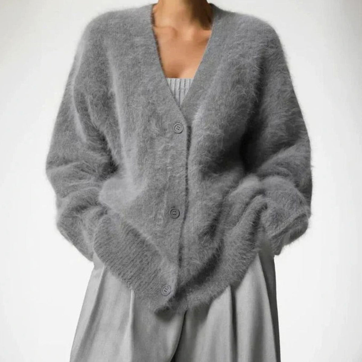 Oversized pluizig damesvest met V-hals en knopen