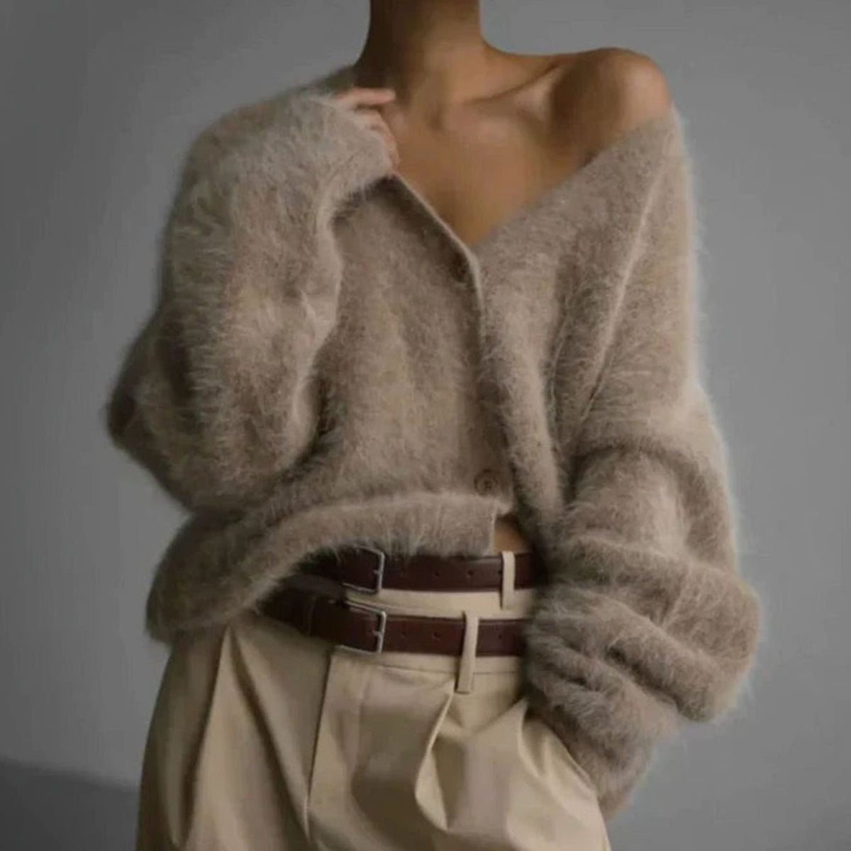 Oversized pluizig damesvest met V-hals en knopen
