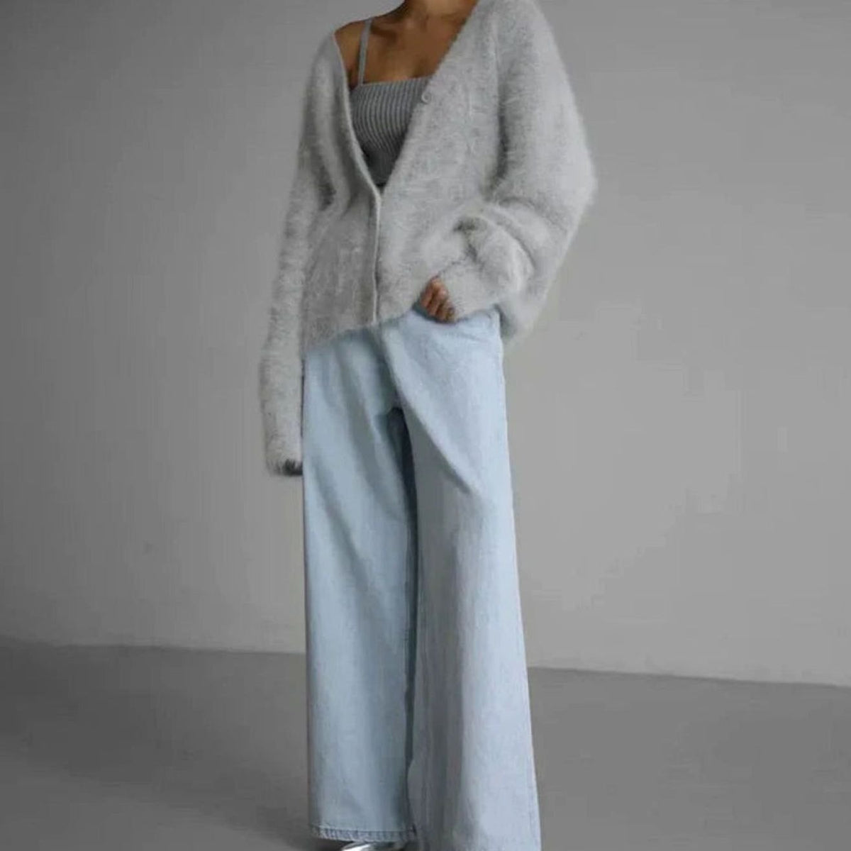 Oversized pluizig damesvest met V-hals en knopen