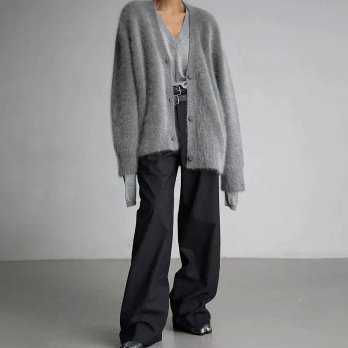 Oversized pluizig damesvest met V-hals en knopen