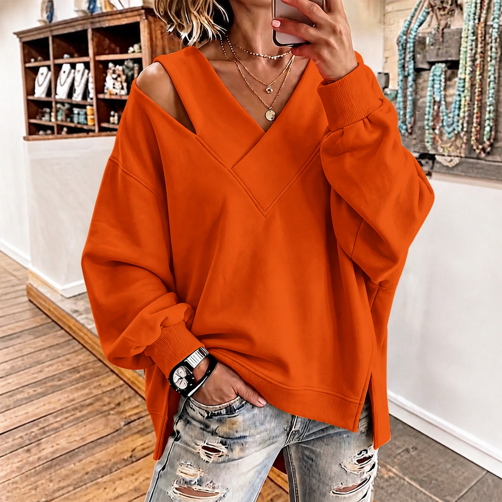 Oversized sweatshirt met asymmetrische schouderuitsnede