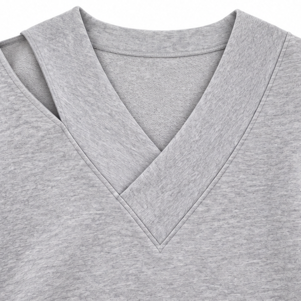 Oversized sweatshirt met asymmetrische schouderuitsnede