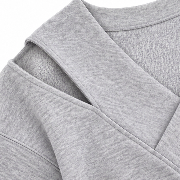 Oversized sweatshirt met asymmetrische schouderuitsnede