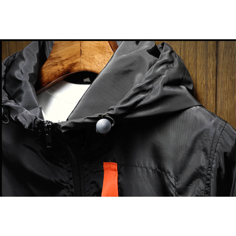 Windjack met capuchon en halve rits